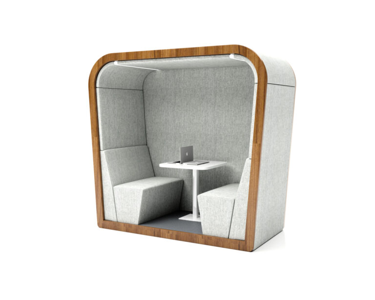 SOL acoustic office pod with internal seating, table, and laptop