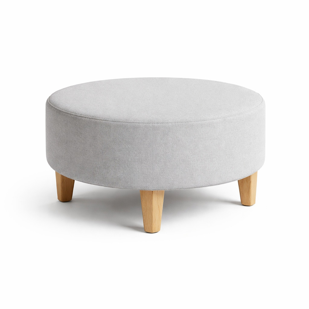 Round upholstered breakout seating with wooden legs
