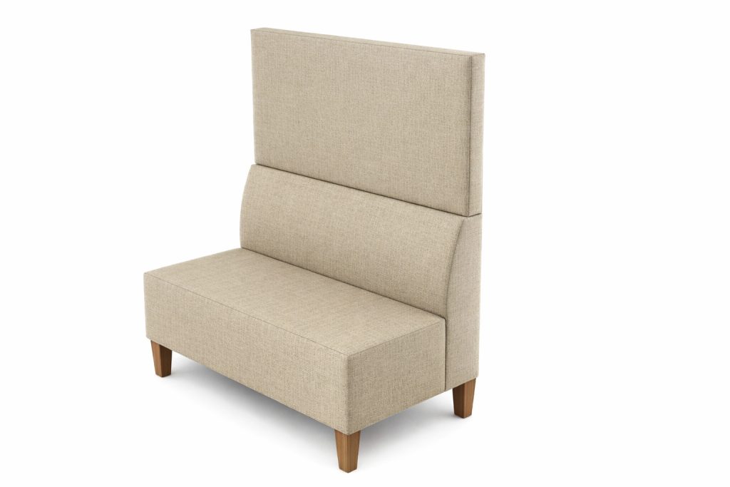 Modular breakout seating with high back, upholstered in light fabric, on wooden legs.