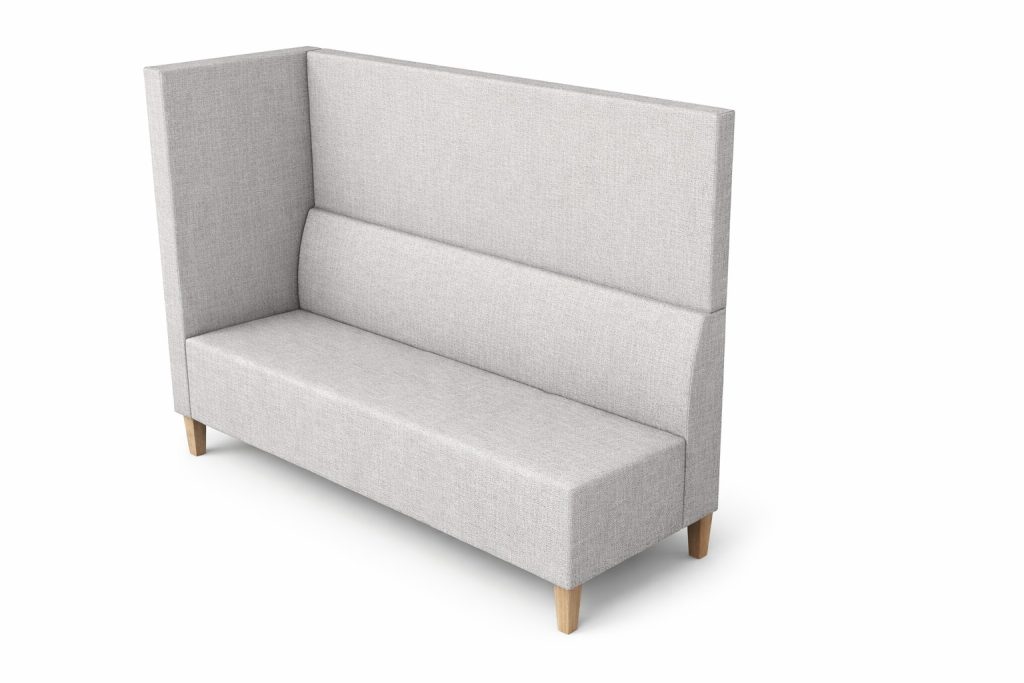Modular breakout seating with high back and side panel, light fabric upholstery, and wooden legs.